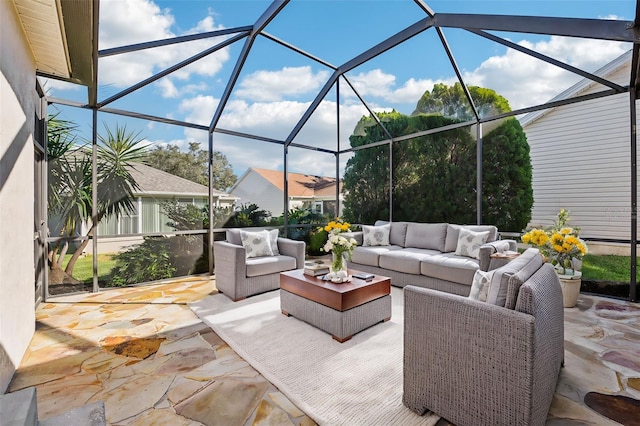 view of patio featuring outdoor lounge area and a lanai