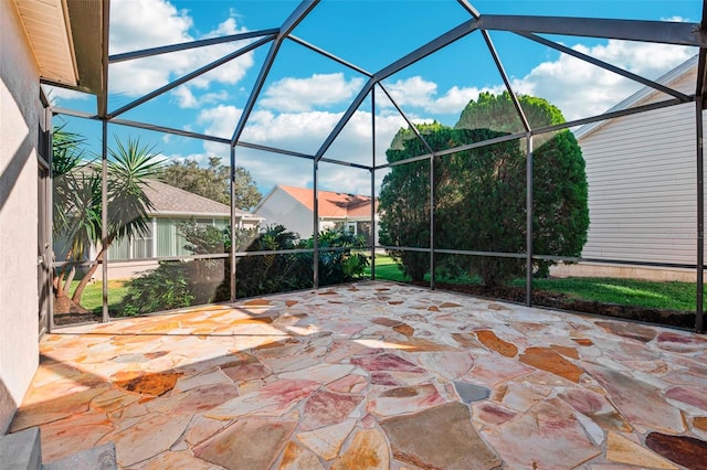 view of patio / terrace with a lanai