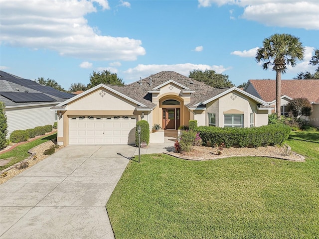 ranch-style home featuring a front yard and a garage