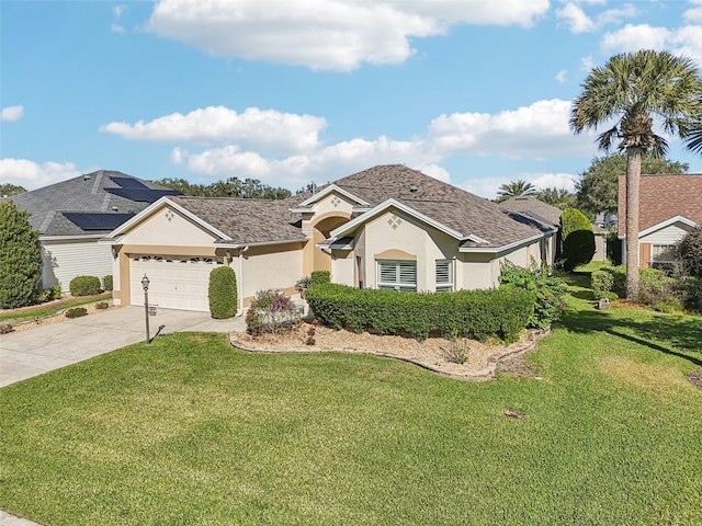 ranch-style home featuring a garage and a front lawn