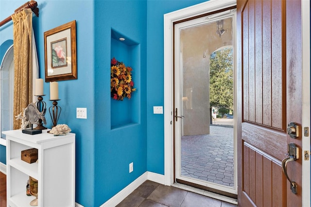 view of tiled foyer entrance