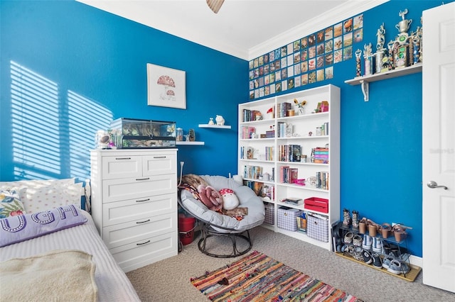 bedroom featuring ceiling fan, ornamental molding, and carpet floors