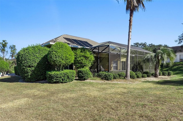 view of yard featuring a lanai