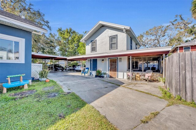 view of front of house featuring a carport