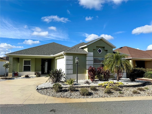 view of front of property featuring a garage