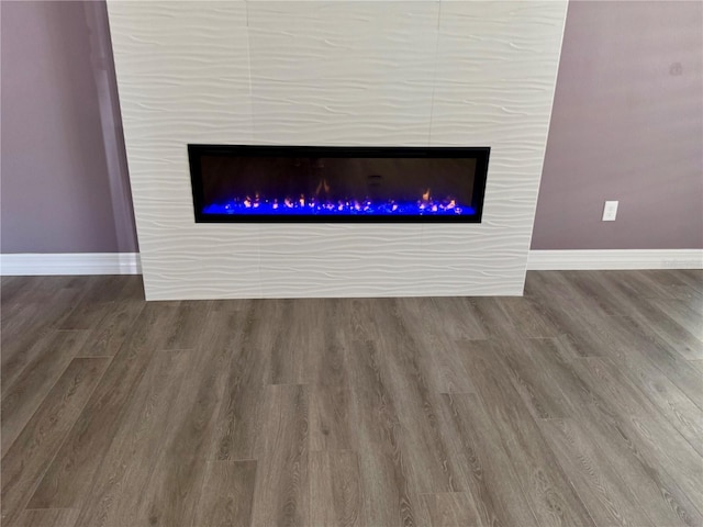 interior details featuring wood-type flooring