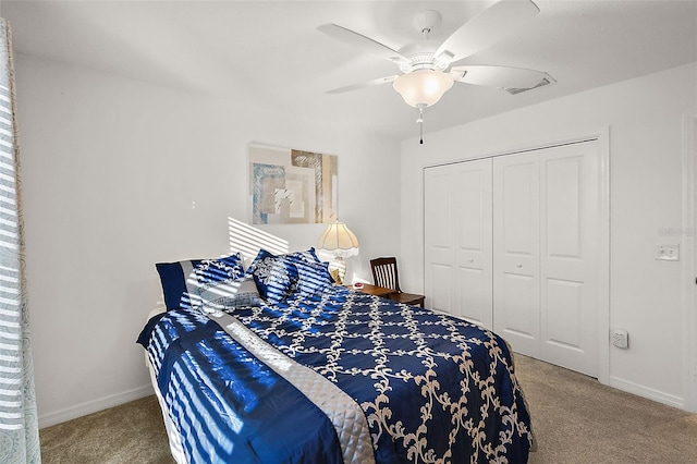 bedroom with carpet, ceiling fan, and a closet