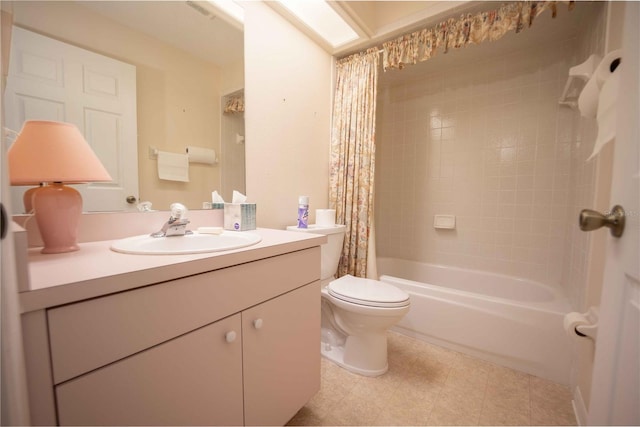 full bathroom with shower / tub combo, vanity, and toilet