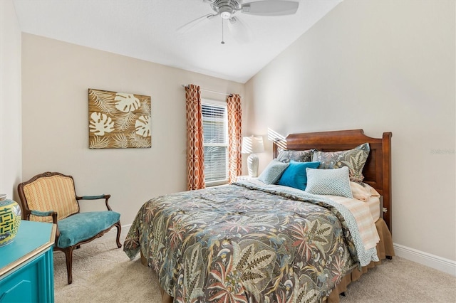 carpeted bedroom with ceiling fan and lofted ceiling