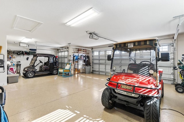 garage featuring a garage door opener