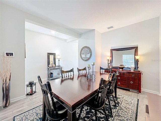 dining area with light hardwood / wood-style flooring