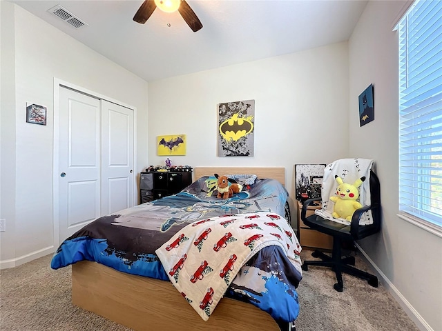 bedroom featuring carpet floors, a closet, and ceiling fan