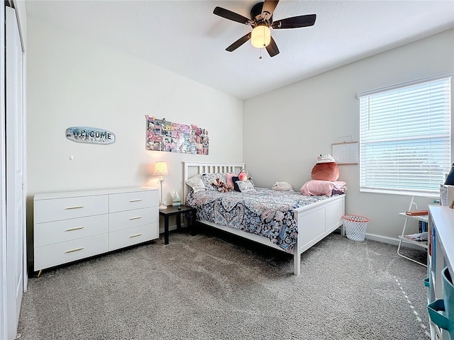 carpeted bedroom featuring ceiling fan