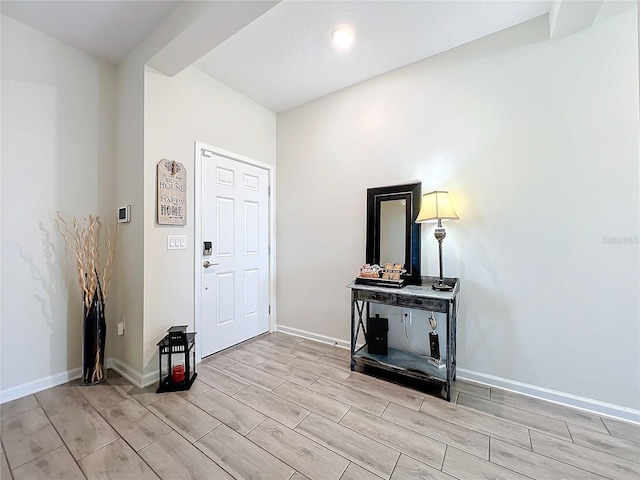 entryway with light hardwood / wood-style floors