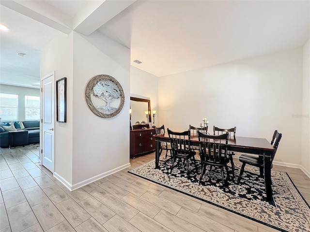 dining area with light hardwood / wood-style flooring