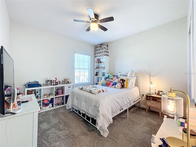 bedroom featuring dark carpet and ceiling fan