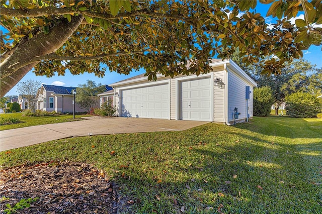 garage with a yard