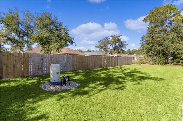 view of yard featuring a fenced backyard