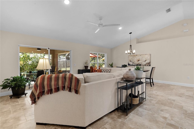 living room featuring baseboards, vaulted ceiling, and ceiling fan with notable chandelier