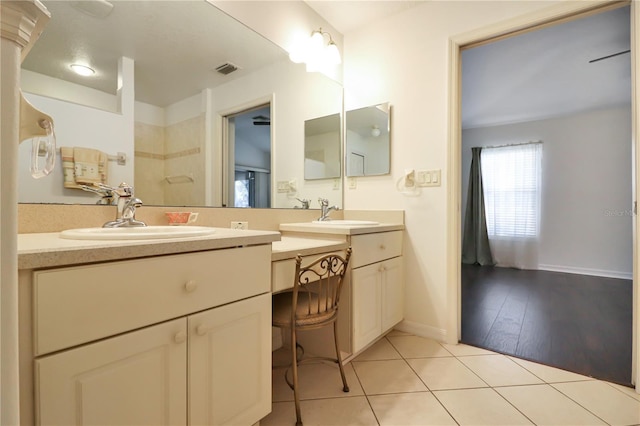 bathroom with vanity and wood-type flooring