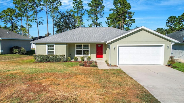 ranch-style house featuring a garage and a front yard