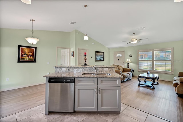 kitchen with dishwasher, hanging light fixtures, vaulted ceiling, light hardwood / wood-style flooring, and ceiling fan