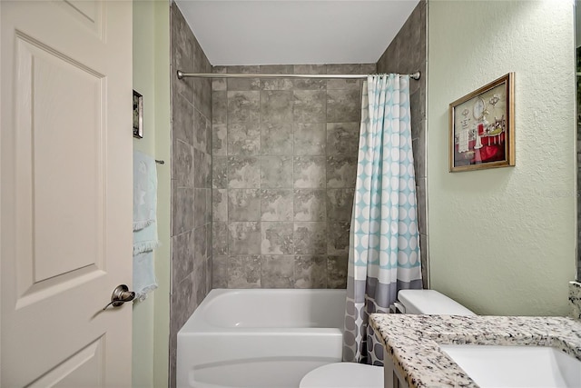 full bathroom featuring shower / bath combination with curtain, toilet, and vanity