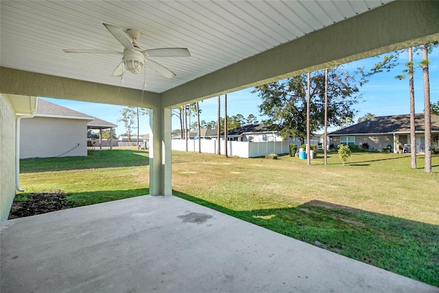 view of patio featuring ceiling fan