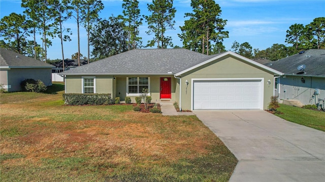 ranch-style home featuring a garage and a front yard