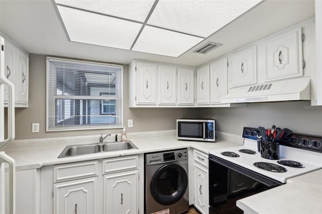 kitchen featuring electric range, washer / clothes dryer, white cabinetry, and premium range hood