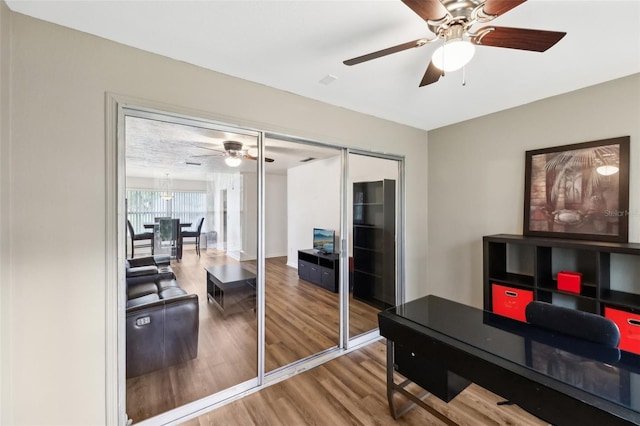 office area featuring ceiling fan and wood-type flooring