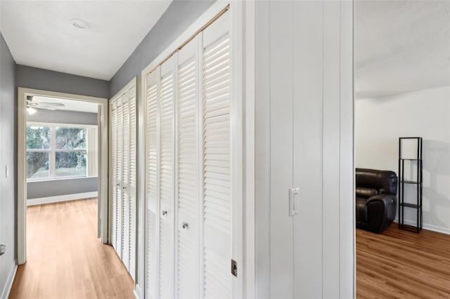 hallway with light wood-type flooring