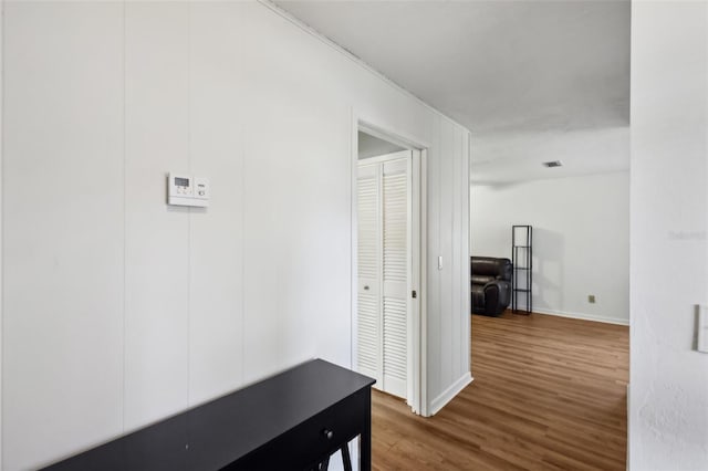 corridor featuring hardwood / wood-style flooring