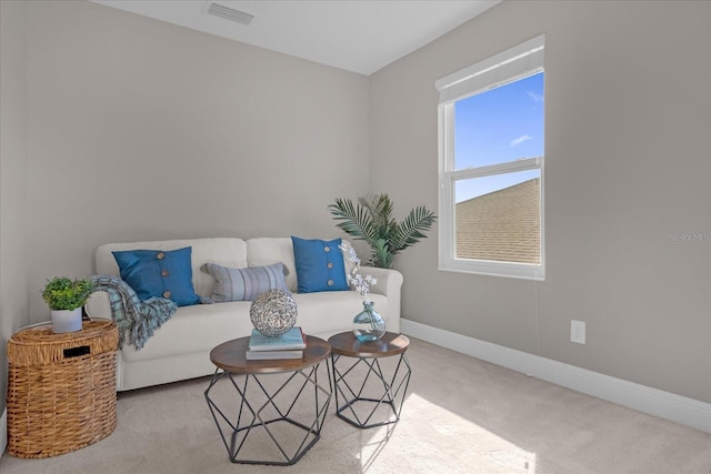 living room with light carpet