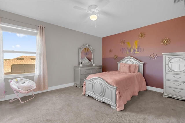 carpeted bedroom with ceiling fan