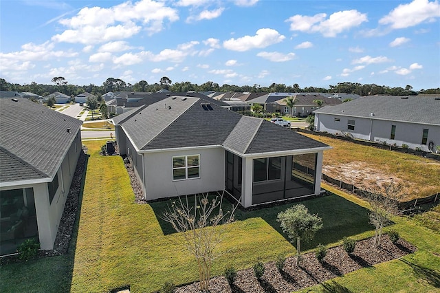 birds eye view of property with a residential view