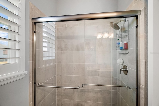 full bathroom featuring a shower stall