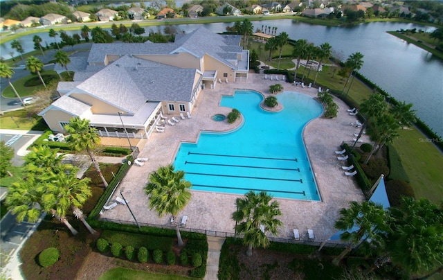 bird's eye view with a water view