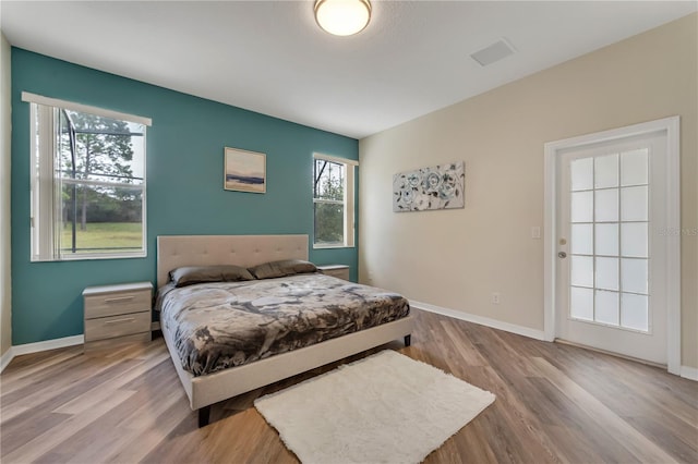 bedroom featuring light hardwood / wood-style floors