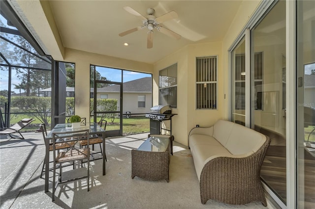 sunroom / solarium with ceiling fan