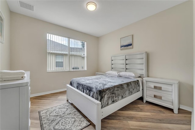 bedroom featuring light hardwood / wood-style flooring