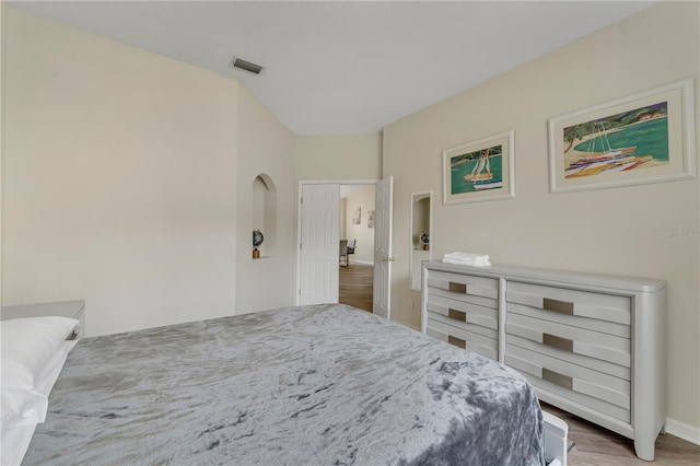 bedroom featuring hardwood / wood-style flooring