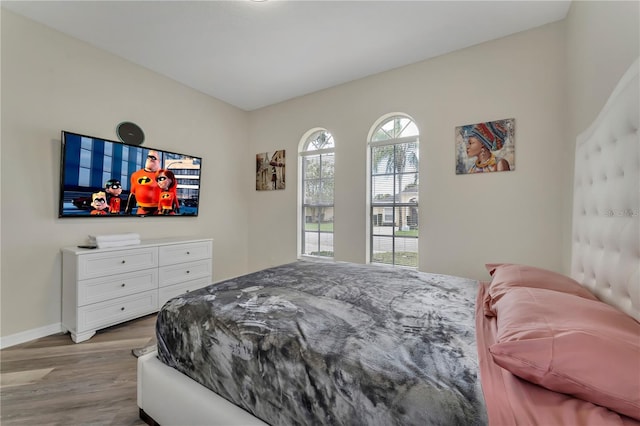 bedroom with light hardwood / wood-style flooring