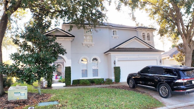 view of front of property featuring a garage