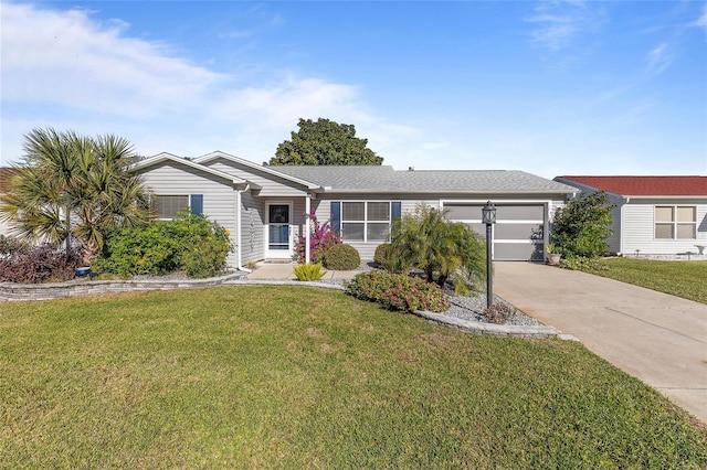 ranch-style house with a garage and a front lawn