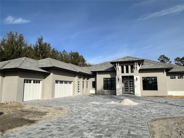 prairie-style home with a garage