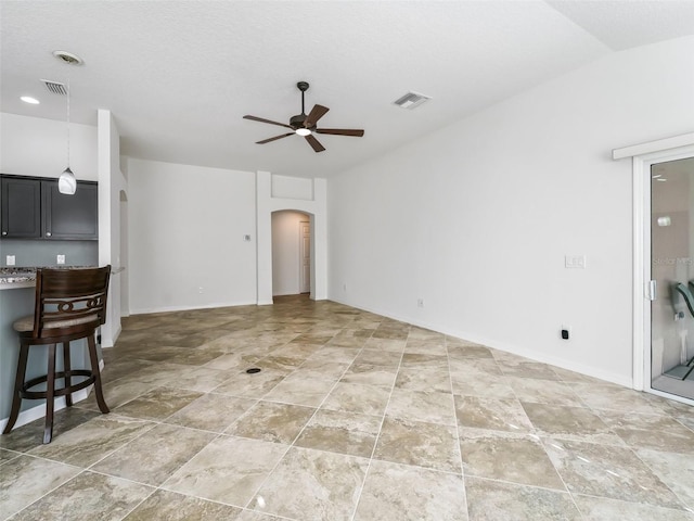 living room with vaulted ceiling and ceiling fan