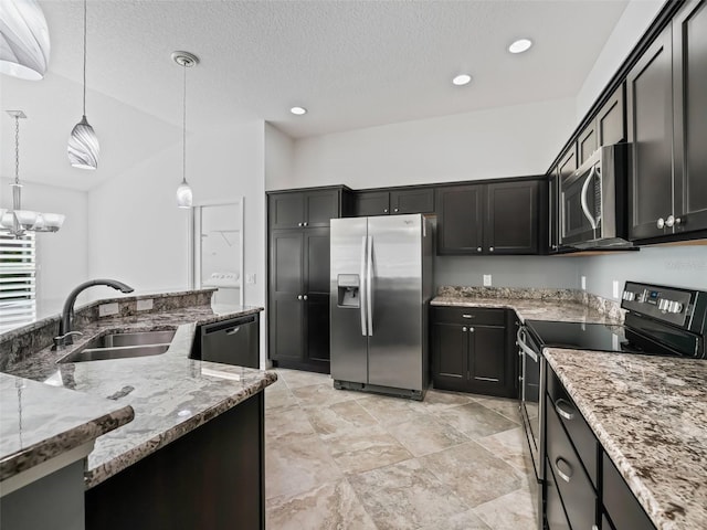 kitchen with pendant lighting, sink, a notable chandelier, light stone counters, and stainless steel appliances