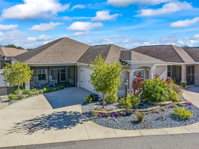 view of front of property with a garage