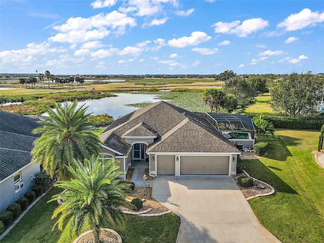 birds eye view of property featuring a water view